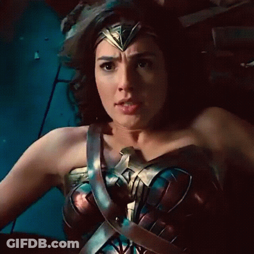 Woman In Wonder Woman Costume Smiling GIF