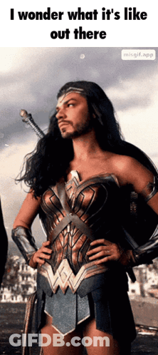 Woman In Wonder Woman Costume With Sword GIF