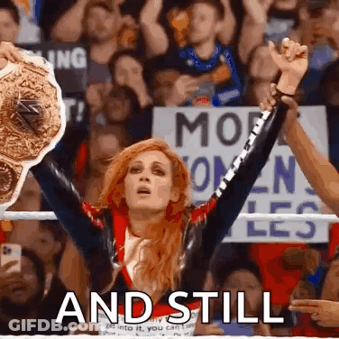 Woman In Wrestling Ring Holding Championship Belt Saying And Still GIF