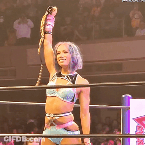 Woman In Wrestling Ring Holding Trophy Saying Next Thing GIF