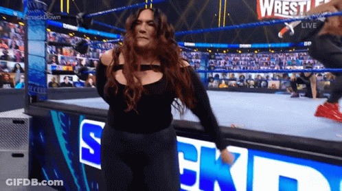 Woman In Wrestling Ring Smack Down Sign GIF