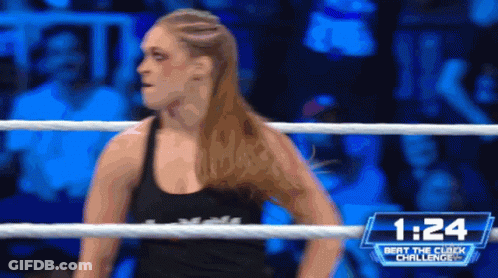 Woman In Wrestling Ring With 1:24 GIF