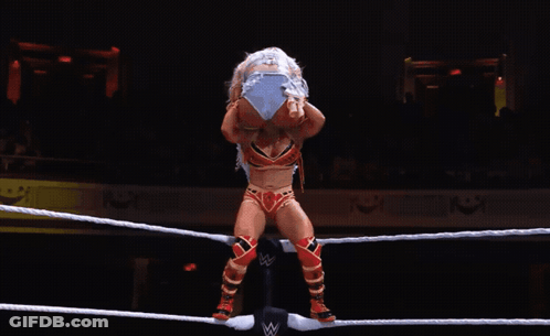 Woman In Wrestling Ring With Letter W GIF