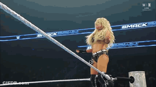 Woman In Wrestling Ring With Live Kansas City Sign GIF