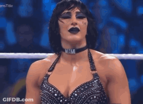 Woman In Wrestling Ring With Mami Choker GIF