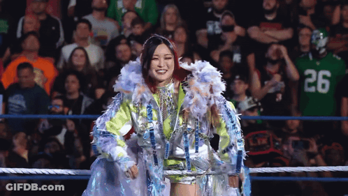Woman In Wrestling Ring With Number 26 Jersey GIF
