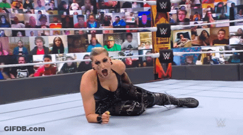Woman In Wrestling Ring With W Logo GIF