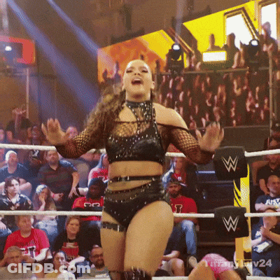 Woman In Wrestling Ring With W On Post GIF
