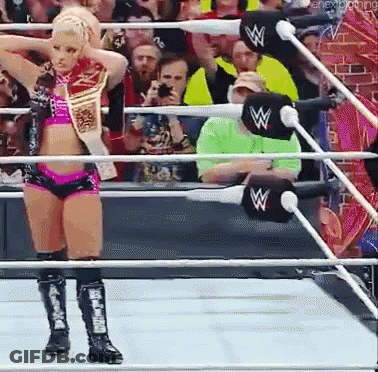Woman In Wrestling Ring With WWE Belt GIF