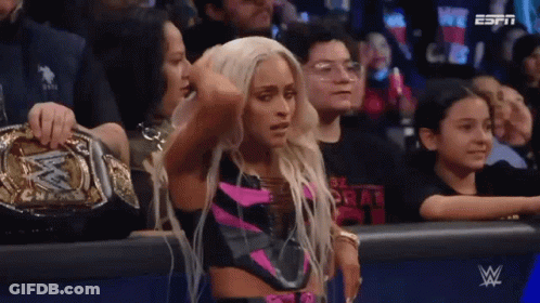 Woman In Wrestling Ring With WWE Championship Belt GIF