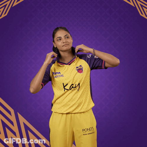 Woman In Yellow And Purple Shirt Saying Kay GIF