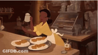 Woman In Yellow Apron Serving Food GIF