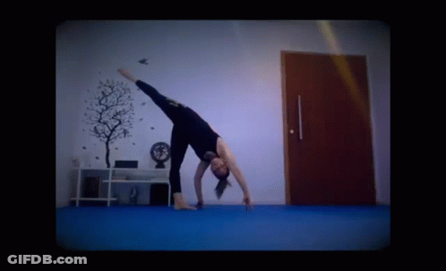 Woman In Yellow Bikini Alternating Side Plank GIF