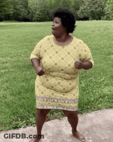 Woman In Yellow Dress Dancing GIF
