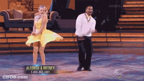 Woman In Yellow Dress Dancing On Dancing With The Stars GIF