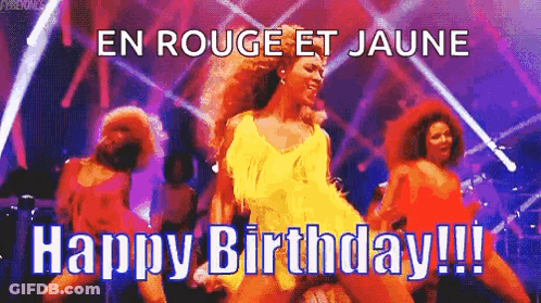 Woman In Yellow Dress Dancing On Stage GIF