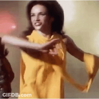 Woman In Yellow Dress Dancing GIF