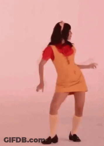 Woman In Yellow Dress Dancing GIF