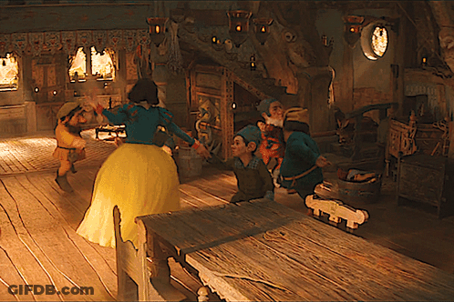 Woman In Yellow Dress Dancing With Dwarfs GIF