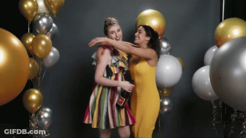 Woman In Yellow Dress Hugging GIF