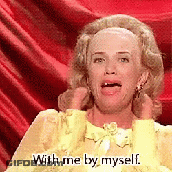 Woman In Yellow Dress Making Funny Face GIF