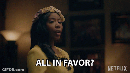 Woman In Yellow Dress Saying All In Favor Next To Netflix Logo GIF