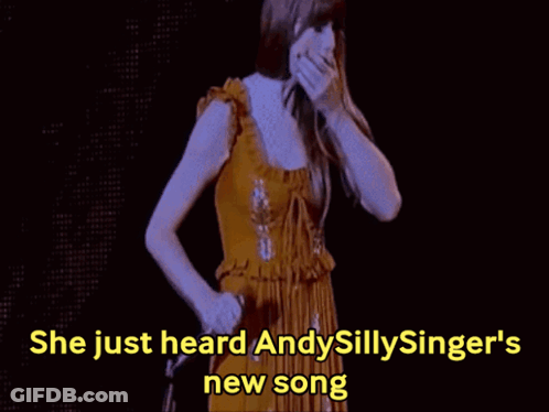 Woman In Yellow Dress Singing She Just Heard Andysillysinger's New Song GIF