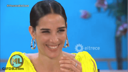 Woman In Yellow Dress Smiling With Eltrece GIF
