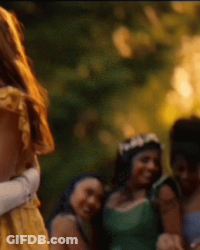 Woman In Yellow Dress Standing GIF