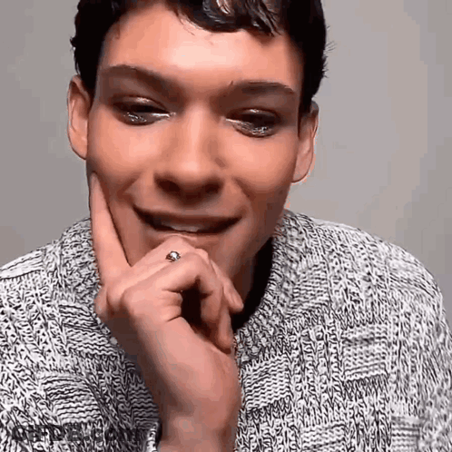 Woman In Yellow Dress Talking To Man In Suit GIF