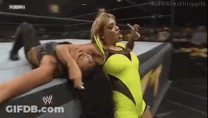 Woman In Yellow Dress Wrestling In Ring GIF
