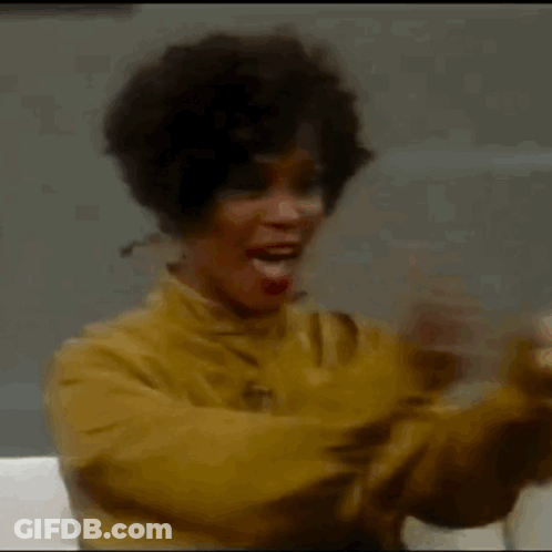 Woman In Yellow Jacket Applauding GIF