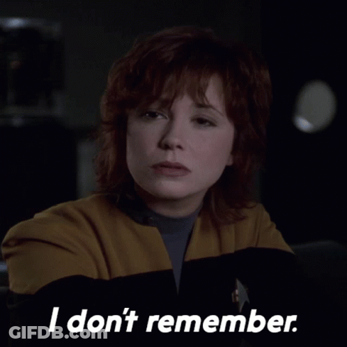 Woman In Yellow Jacket Saying I Don't Remember GIF