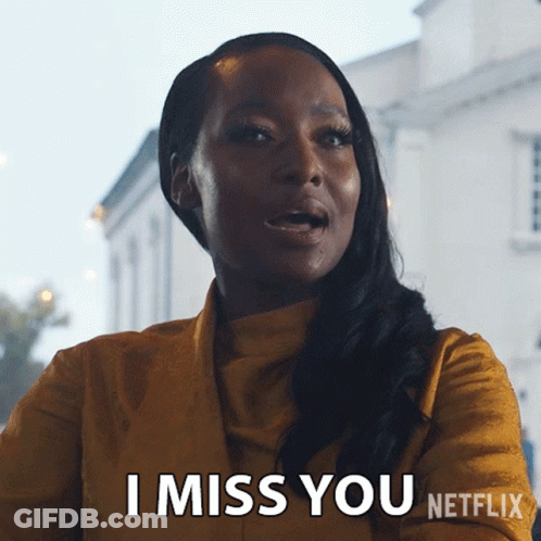 Woman In Yellow Jacket Saying I Miss You GIF