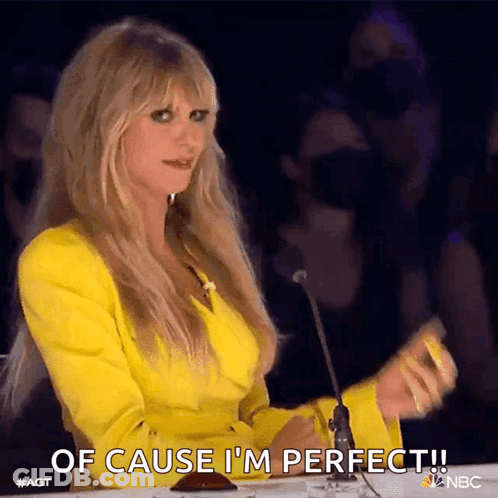 Woman In Yellow Jacket Saying Of Cause I'm Perfect GIF