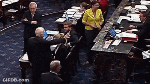 Woman In Yellow Jacket Speaking GIF