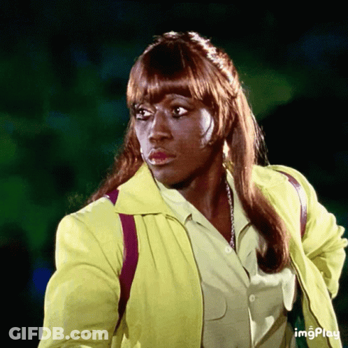 Woman In Yellow Jacket With Word Imgplay GIF
