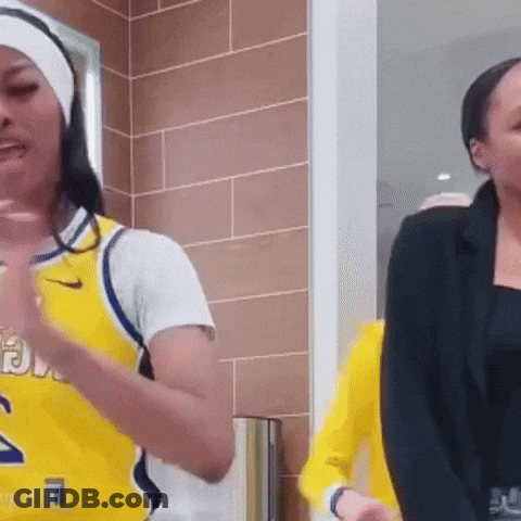 Woman In Yellow Jersey Number 2 Dancing GIF