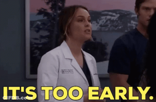 Woman In Yellow Lab Coat Says It's Too Early GIF