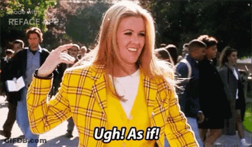 Woman In Yellow Plaid Jacket Before Crowd GIF