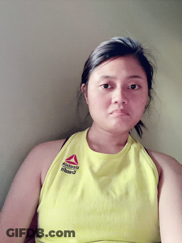 Woman In Yellow Reebok Tank Top GIF