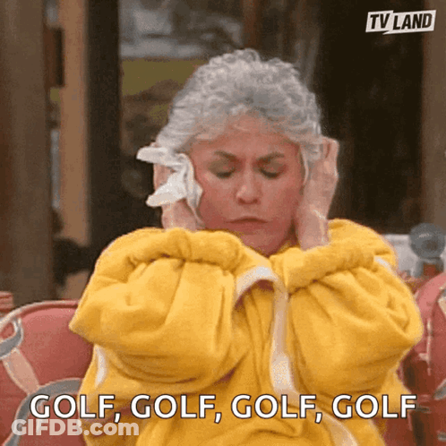 Woman In Yellow Robe Covering Ears Saying Golf GIF