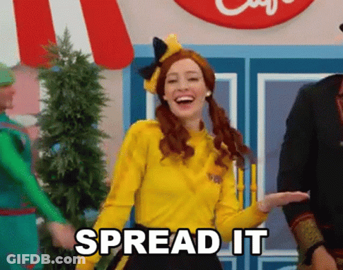 Woman In Yellow Shirt Dancing Saying Spread It GIF