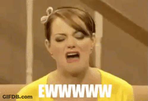 Woman In Yellow Shirt Making Funny Face GIF