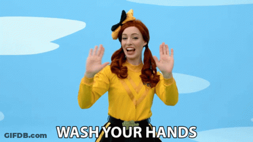 Woman In Yellow Shirt Saying Wash Your Hands GIF