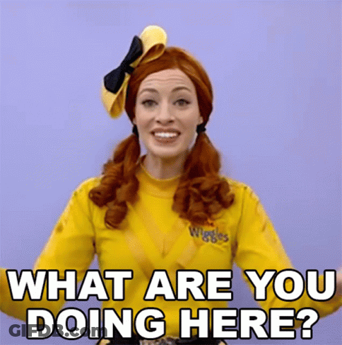 Woman In Yellow Shirt Saying Wiggles Asking What Are You Doing Here GIF
