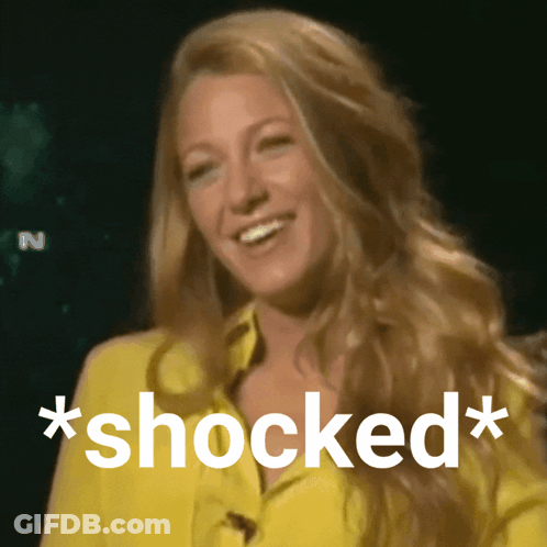 Woman In Yellow Shirt Shocked GIF