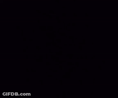 Woman In Yellow Shirt Sitting In Back Seat Hand On Head GIF