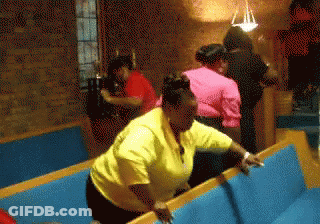 Woman In Yellow Shirt Sitting On Blue Bench GIF