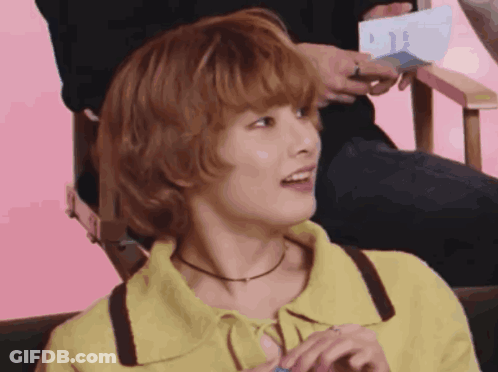 Woman In Yellow Shirt Sitting GIF